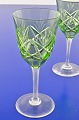 Hvidvinsglas 
med grøn kumme, 
højde 14,5 cm. 
diameter 6,4 
cm. Muligvis 
produceret hos 
Val St. ...