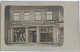 Postkort: 
Butiksfacade 
Beklædning. 
Annulleret 
ASSENS I 1909. 
I god stand.