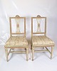 Dette sæt af to 
stole i 
Gustaviansk 
stil fra 1880 
er et smukt 
udtryk for 
tidlig 
europæisk ...