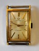 Omega dame 
armbåndsur, 
Ladymatic, 
1950'erne, 
Schweiz. I 
forgyld kasse. 
3 x 1,8 cm. 
NB: Glas er 
...