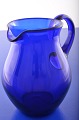 Holmegaard / 
Kastrup 
glasværk, 
mælkekande af 
blåt glas, 
højde 15,8 cm. 
Rummål 90.0 cl. 
Pæn hel ...