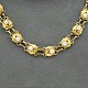 Tidligt Georg 
Jensen guld 
smykke.
Leddelt 
halskæde i 18 
kt. guld prydet 
med perler. 
Dessin nr. ...