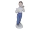 Bing & Grøndahl 
figur, pige med 
en hvid bamse 
og 
blomsterbuket.
Af 
fabriksmærket 
ses det, at ...