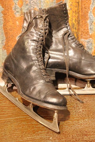 A couple of decorative, old skates in leather with very fine patina.