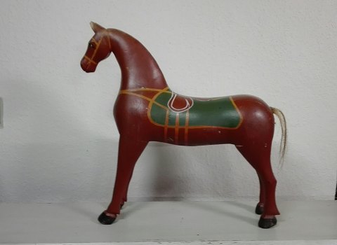 Large wooden horse in carved wood