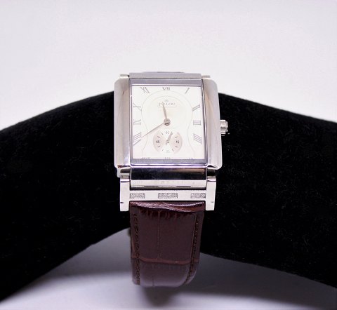 Jullou herre armbåndsur med swiss quartz urværk, urkasse af stål med 20 
indbefattede diamanter og brun læderrem.
5000m2 udstilling.