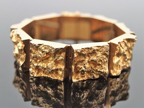 Kraftigt armbånd af 14 kt. guld, dansk