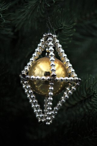Old Christmas decorations from 1930 made of small glass beads and glass ball to 
hang on the Christmas tree. H:8cm.
