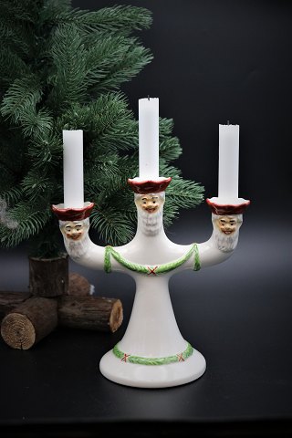 Old Swedish porcelain candlestick in porcelain with 3 Santa faces...