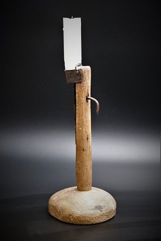 Swedish 1800 century candlestick in wood and iron with a super fine old patina. 
Height: 20.5cm.