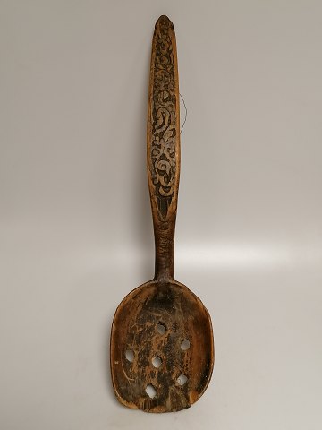 Swedish common hole spoon of wood dated 1866