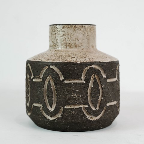 Ceramic vase in dark nuances by Loevemose Ceramics from the 1960s.
5000m2 showroom.
