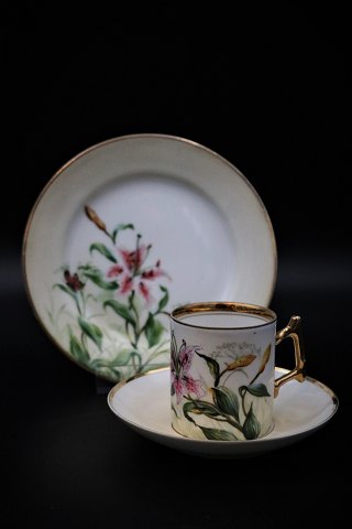 Antique 1800s coffee set, coffee cup, saucer & cake plate from Bing & Grondahl 
with hand-painted lilies decorated with gold edge.