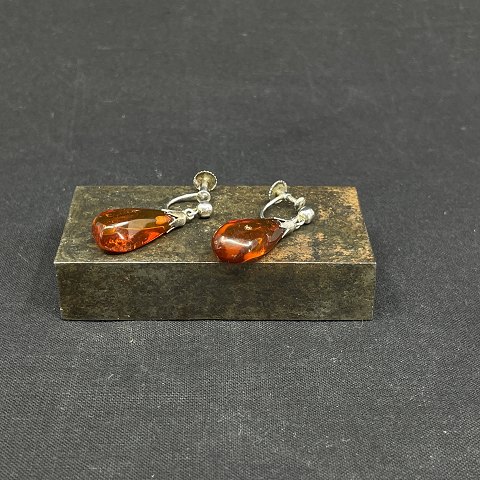 A set of earrings with amber