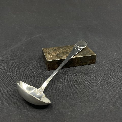 Cream spoon in silver, wooden spoon