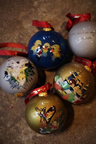 Old Christmas glass balls from Royal Copenhagen with H.C. Andersen fairy tale 
motifs...