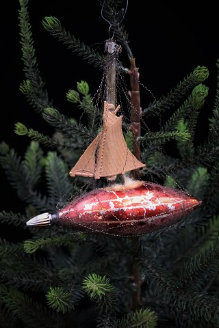 Old glass Christmas ornament in the shape of a Zeppelin from around 1920-40...
