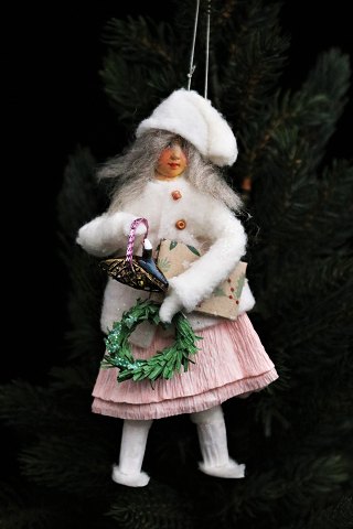 Unique Christmas tree decorations in the form of a handmade Christmas girl...