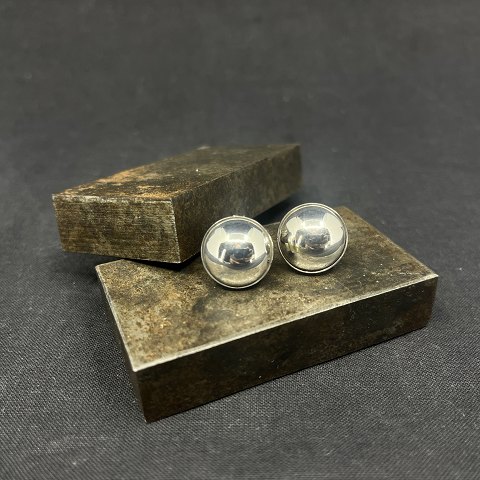 A pair of ear clips from N. E. From