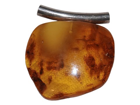 Large amber pendant with silver mounting