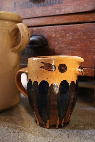 "Lillerød" owl jug in glazed earthenware in fine glaze brownish colors. Height: 
13cm...