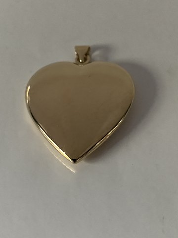 Beautiful and elegant gold heart in 14 carat gold. Stamped 585 Pendant for 
necklace.