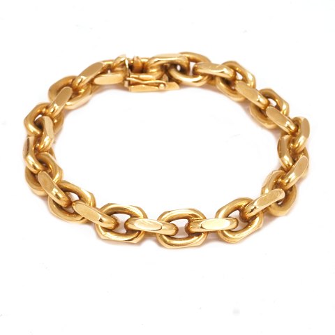 Kraftig anker armlænke i 14kt guld. L: 20,5cm. 
Ledstr. 8x12mm. V: 63,8gr