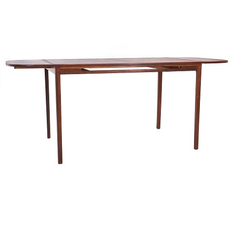 Writing desk by Ole Wanscher with two extension leaves in mahogany and rosewood crafted by A. J. Iversen.Exhibited at the Copenhagen Cabinetmakers’ Guild Exhibition 1965. Dimensions:H: 74 cm. W: 79 cm. L: 120 / 151.5 / 183cm