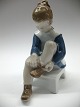 Marianne figur 
nr. 2373 fra 
Bing & Grøndahl 
designet af 
Claire Weiss 
født 1906. 
Højde 15 cm. 
...