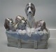 Lladro Spain 
Four puppies in 
a basket 23 x 
24 cm In nice 
and mint 
condition