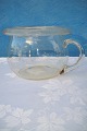 Smuk gammel 
glaspotte, 
opdrevet potte 
med omlagt 
bøjet kant, 
kuglet bund. 
højde 12,5cm. 
diameter ...