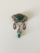 Early Evald 
Nielsen Silver 
Brooch with 
Green Stones. 
Measures 6.7 cm 
x 4.5 cm / 2 
41/64" x 1 ...