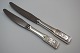 Knive med 
Københavns 
byvåben 
fremstillet til 
HAFNIA af 
sølvsmed Aage 
Weimar. Længde 
25,1 cm og ...