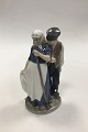Royal Copenhagen Figurine Harvest People No 1300. Designed by Christian Thomsen. Measures 20 cm ...