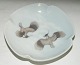 Askebæger i 
porcelæn fra 
Royal 
Copenhagen. 2. 
sortering. 
Dekoreret med 
viber. 
Fremstillet 
mellem ...