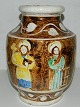 Vase i lertøj 
med religiøst 
motiv af Anders 
Høy. 
Fremstillet i 
1930´erne. I 
god stand. 
Enkelte ...