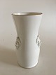 Royal 
Copenhagen Art 
Nouveau Vase 
med ansigter No 
21/81. Måler 
26,7cm og er i 
god stand.
