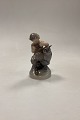 Royal 
Copenhagen 
Figur Faun med 
Ugle No. 2107. 
Designet af 
Chr. Thomsen i 
1920. 
Måler 16 cm x 
...
