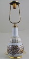 Dahl Jensen 
bordlampe af 
krakele 
porcelæn, 
dekoreret i 
guld.
I flot stand. 
Total højde : 
59 cm. ...