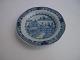 Blå, dyb 
tallerken af 
kinesisk 
porcelæn, Kina 
ca. 1780.
22.5cm. i 
diameter.