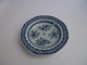 Blå, dyb 
tallerken af 
kinesisk 
porcelæn, Kina 
ca. 1780.
23cm. i 
diameter.