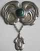 Danish Art 
Nouveau Brooch 
in silver, c. 
1910. With 
malekit. 
Decorated with 
leaves. L .: 
10,5 cm. ...