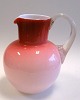 Kande i 
lyserødt glas, 
o. 1900, 
Danmark, hvidt 
opaline glas 
med lyserødt 
overfang. Klar 
"snegle" ...