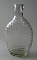 Knupret lomme 
l&aelig;rke, 
Danmark, 19. 
&aring;rh. 
Klart glas. H.: 
12,5 cm. 
Antagelig 
Kastrup. ...