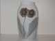 Royal 
Copenhagen 
lille Art 
Nouveau vase 
med primula.
Af 
fabriksmærket 
ses det, at 
denne er ...