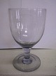 Stort 1800-tals 
drikkeglas
grålig i 
glasmasse
Højde 21,7cm 
Diameter kumme 
13cm. Diameter 
fod ...