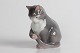 Bing & Grøndahl 
figurine
Sitting cat no 
1553
designed by 
Dahl Jensen
Height 10 cm
1. ...