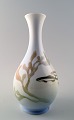 Royal 
Copenhagen art 
nouveau vase 
dekoreret med 
fisk. 
Måler 22 cm. 
Stemplet. 
1. sortering, 
i ...
