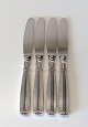 Lotus middags 
kniv i sølv og 
stål
Længde 22cm.
Stemplet 830s
Lager: 2