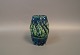 Keramik vase 
med mørkeblå og 
grøn glasur fra 
1960erne af en 
ukendt 
keramiker.
H: 9,5 cm og 
Dia: ...